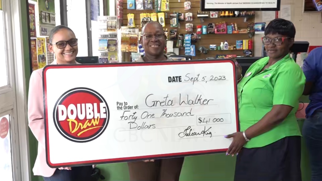 Double Draw winner collects cheque Caribbean Broadcasting Corporation